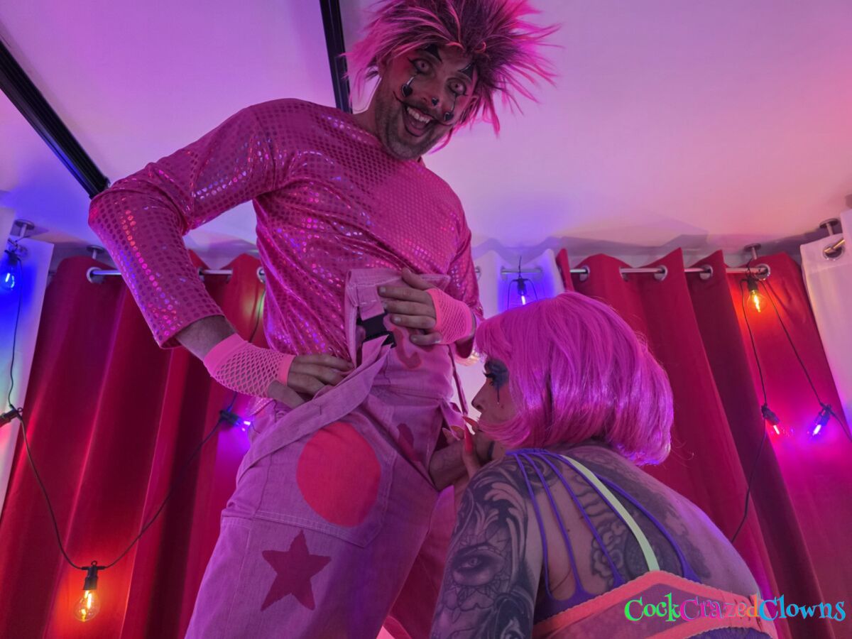 Jessie Rae Meets the Purple & Pink Cock Crazed Clowns