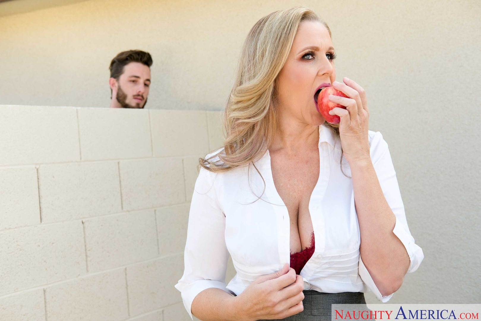 Mature professor Julia Ann fucking in the desk with her tits