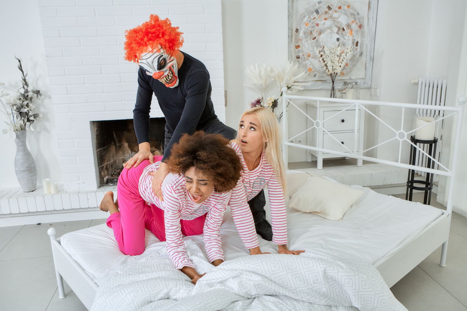 Bisexual chicks ride an evil clown