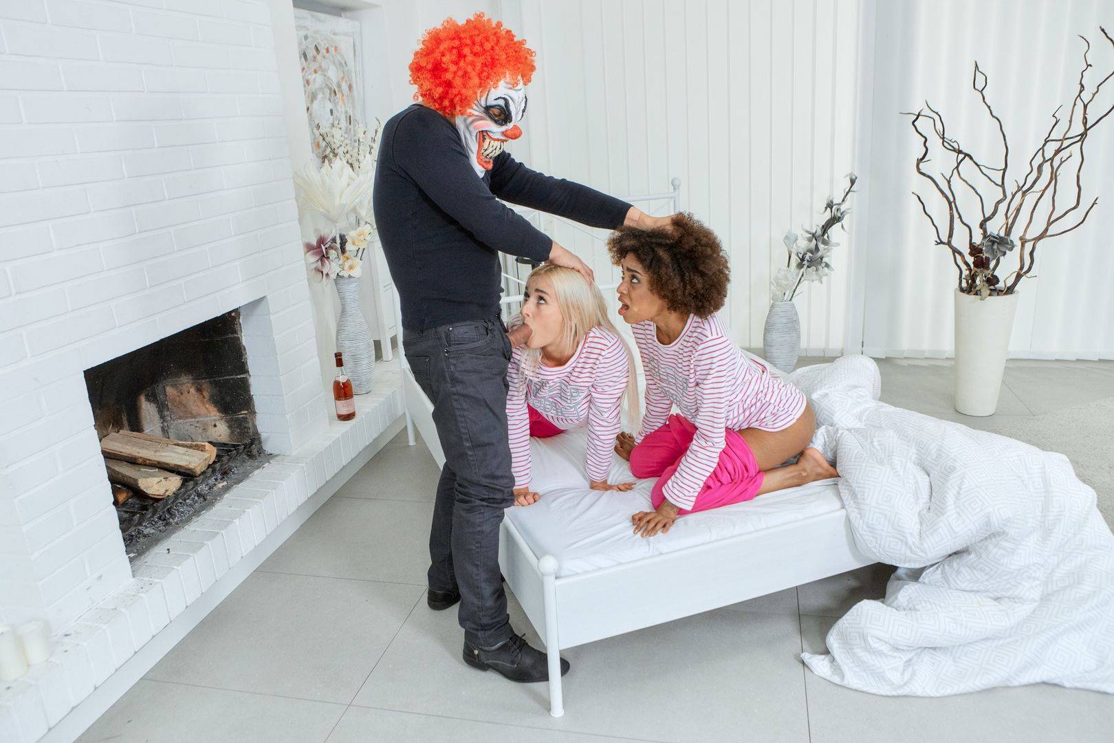 Bisexual chicks ride an evil clown