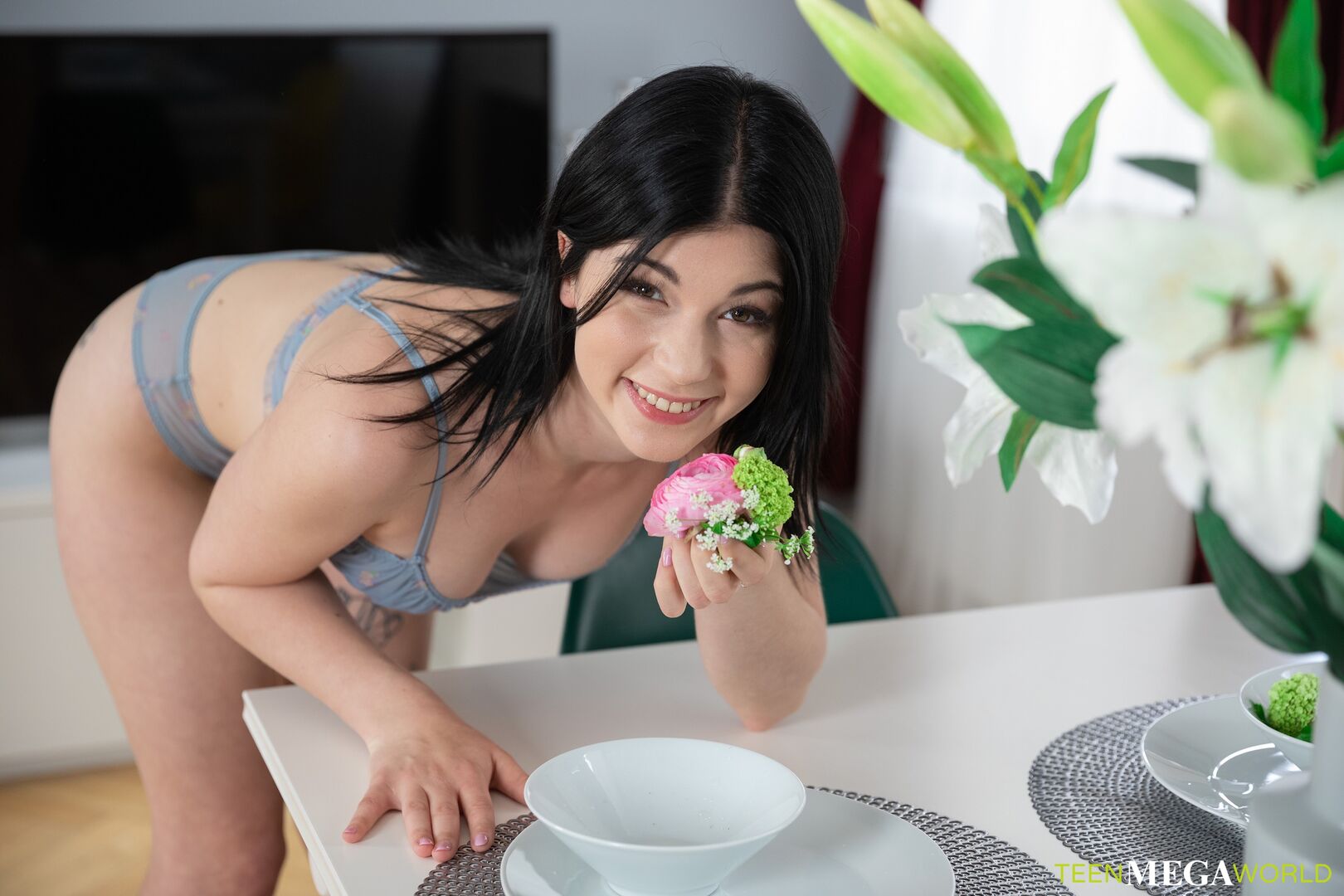Brunette kneels to drink sperm