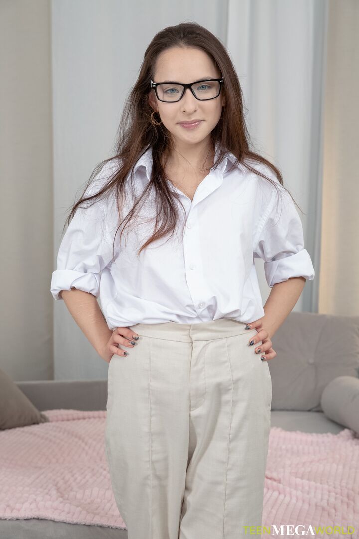 Hottie in glasses opens wet pussy