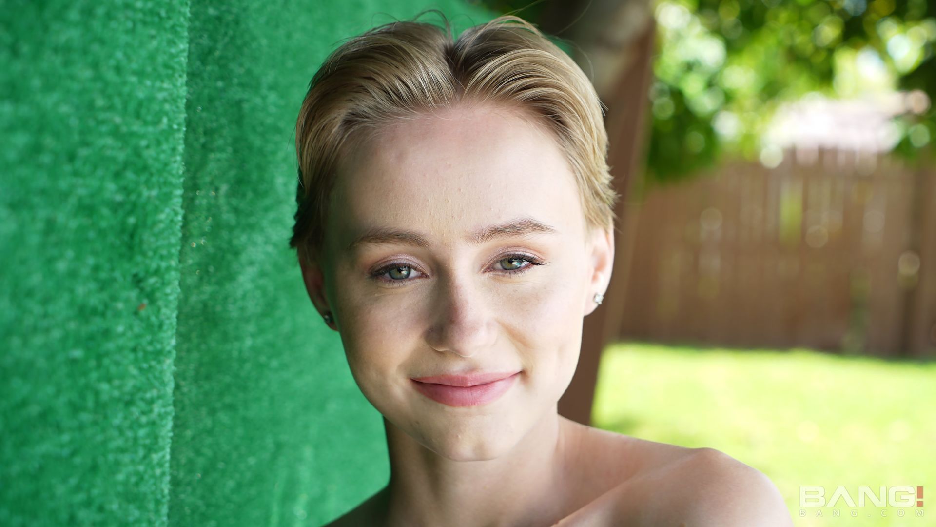 Alicia Williams Plays In The Sprinklers In A White T-Shirt