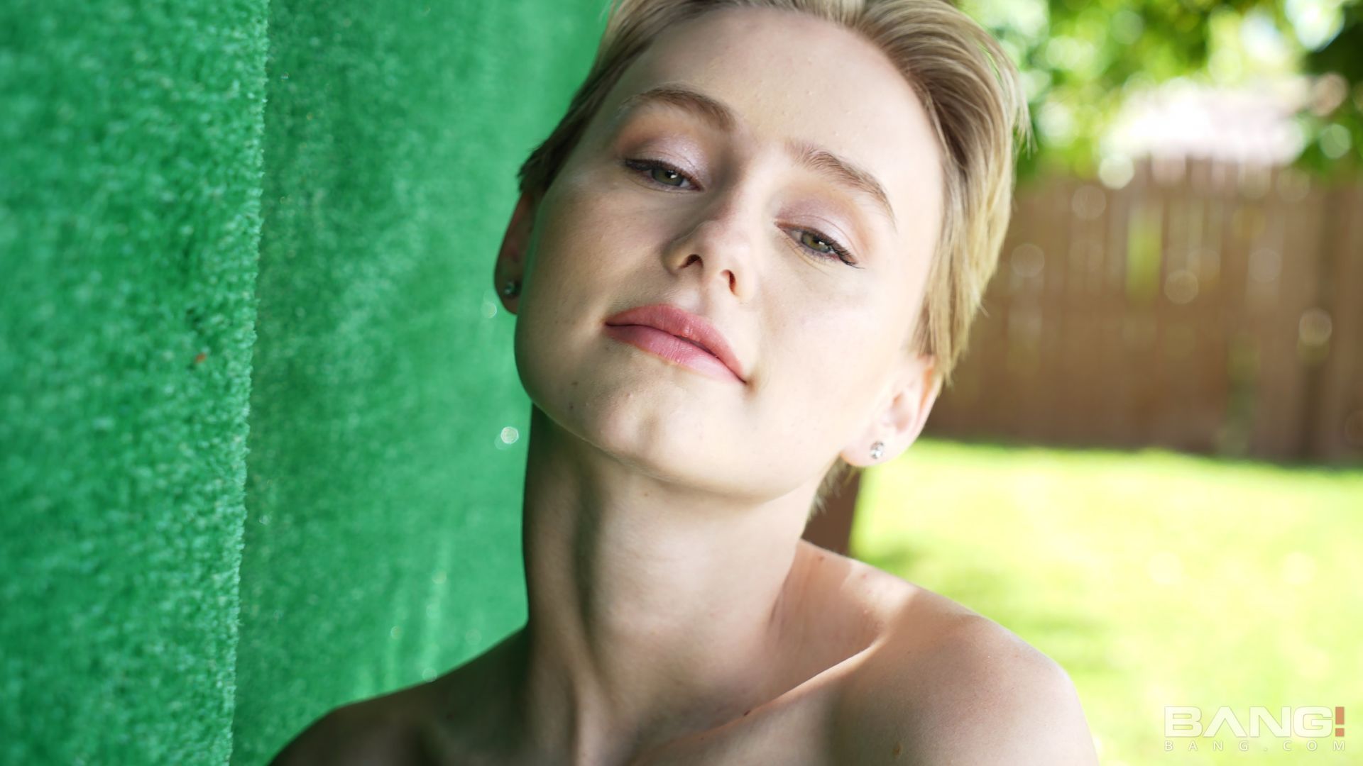Alicia Williams Plays In The Sprinklers In A White T-Shirt