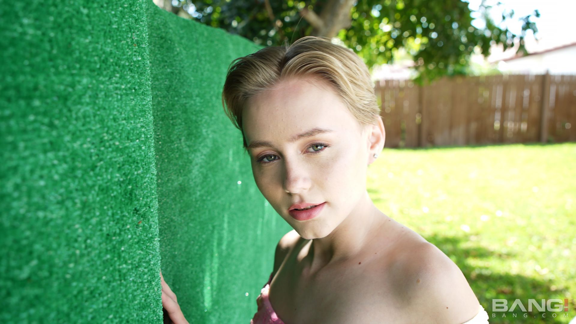 Alicia Williams Plays In The Sprinklers In A White T-Shirt