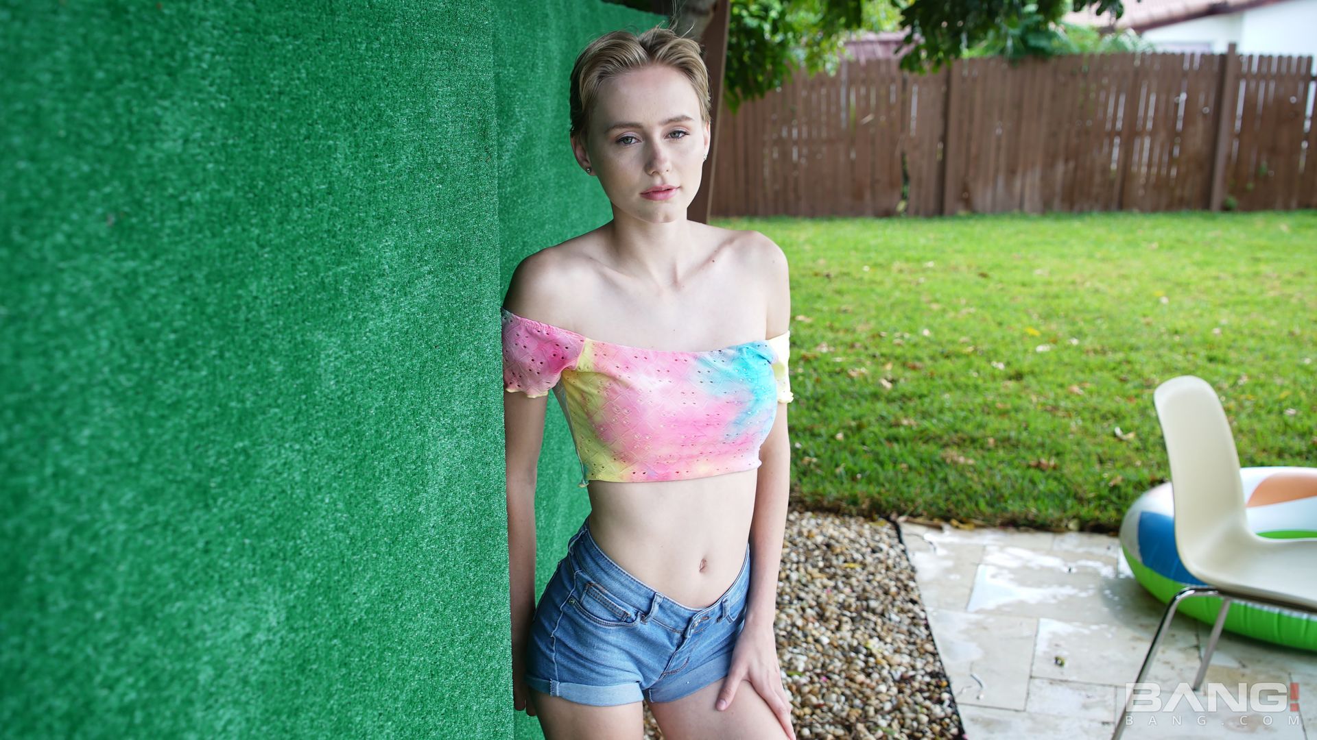 Alicia Williams Plays In The Sprinklers In A White T-Shirt