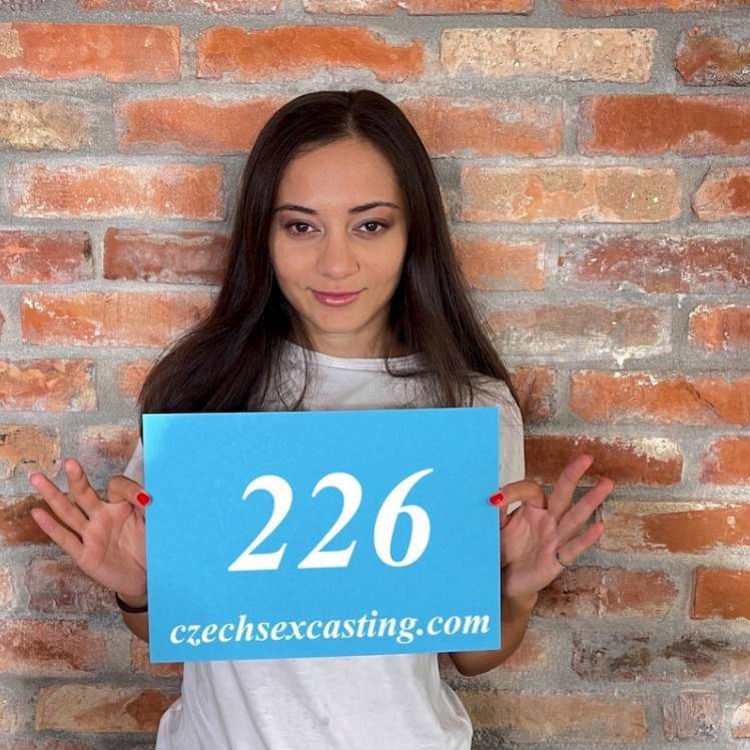 Experienced actress is playing with a photographer