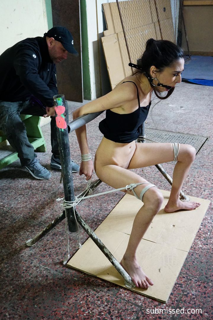 Tied up brunette loves magic wand