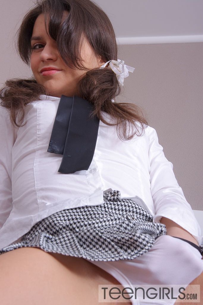 Adorable Brunette Teen Nina Seduces in Schoolgirl Outfit!