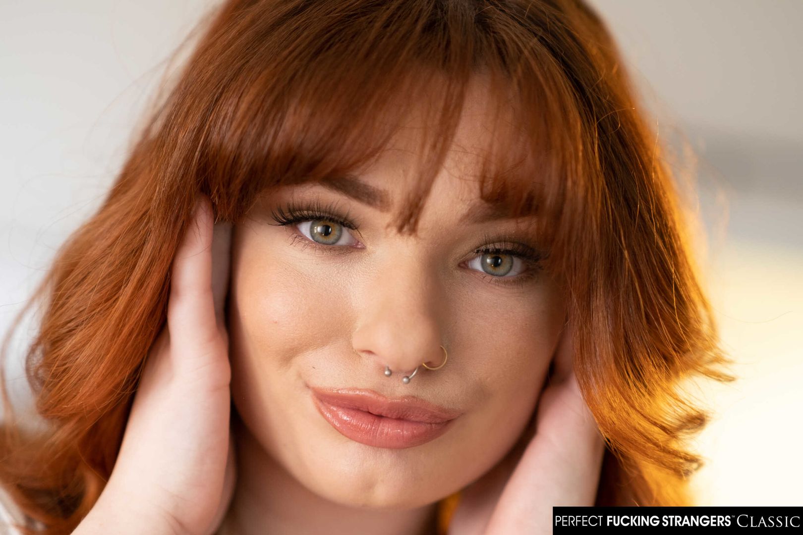 Sexy red head Annabel Redd makes her big natural boobs bounce