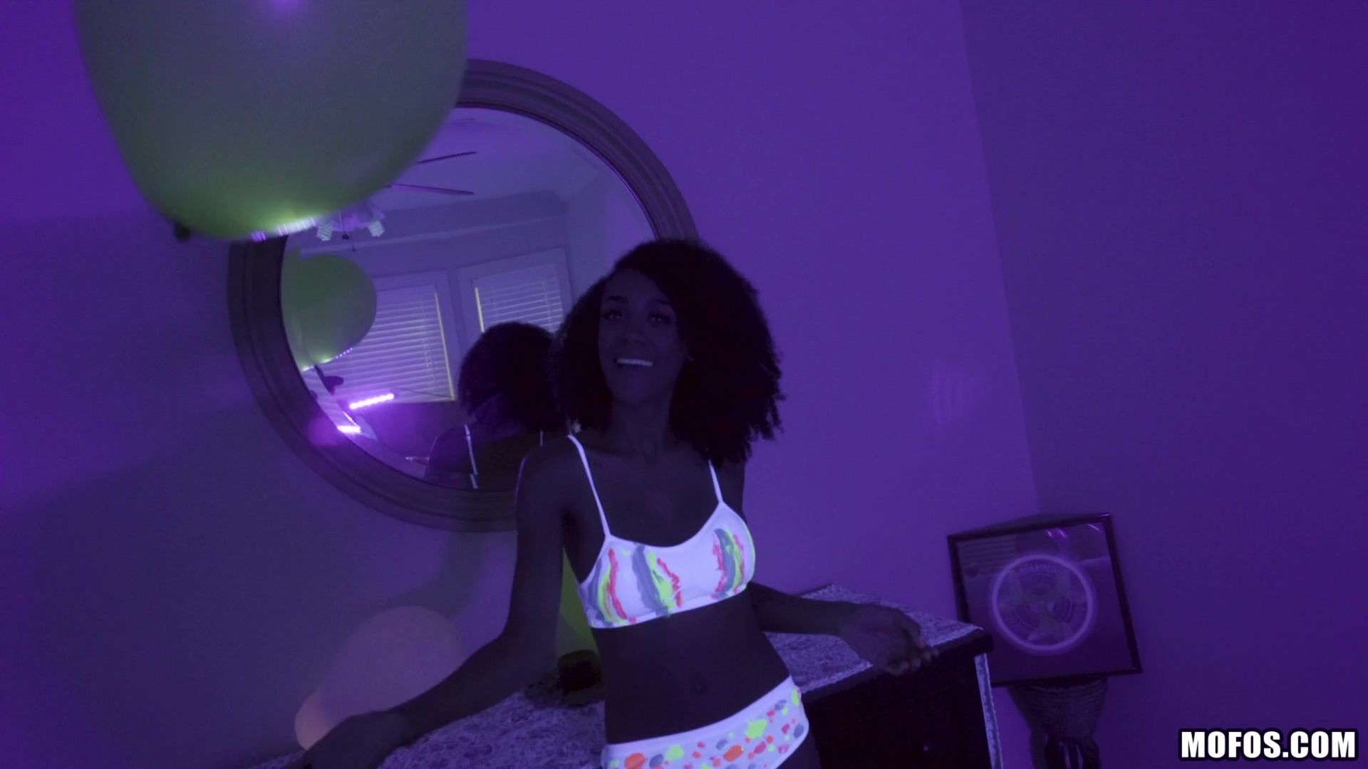 Busty Black Light Babe