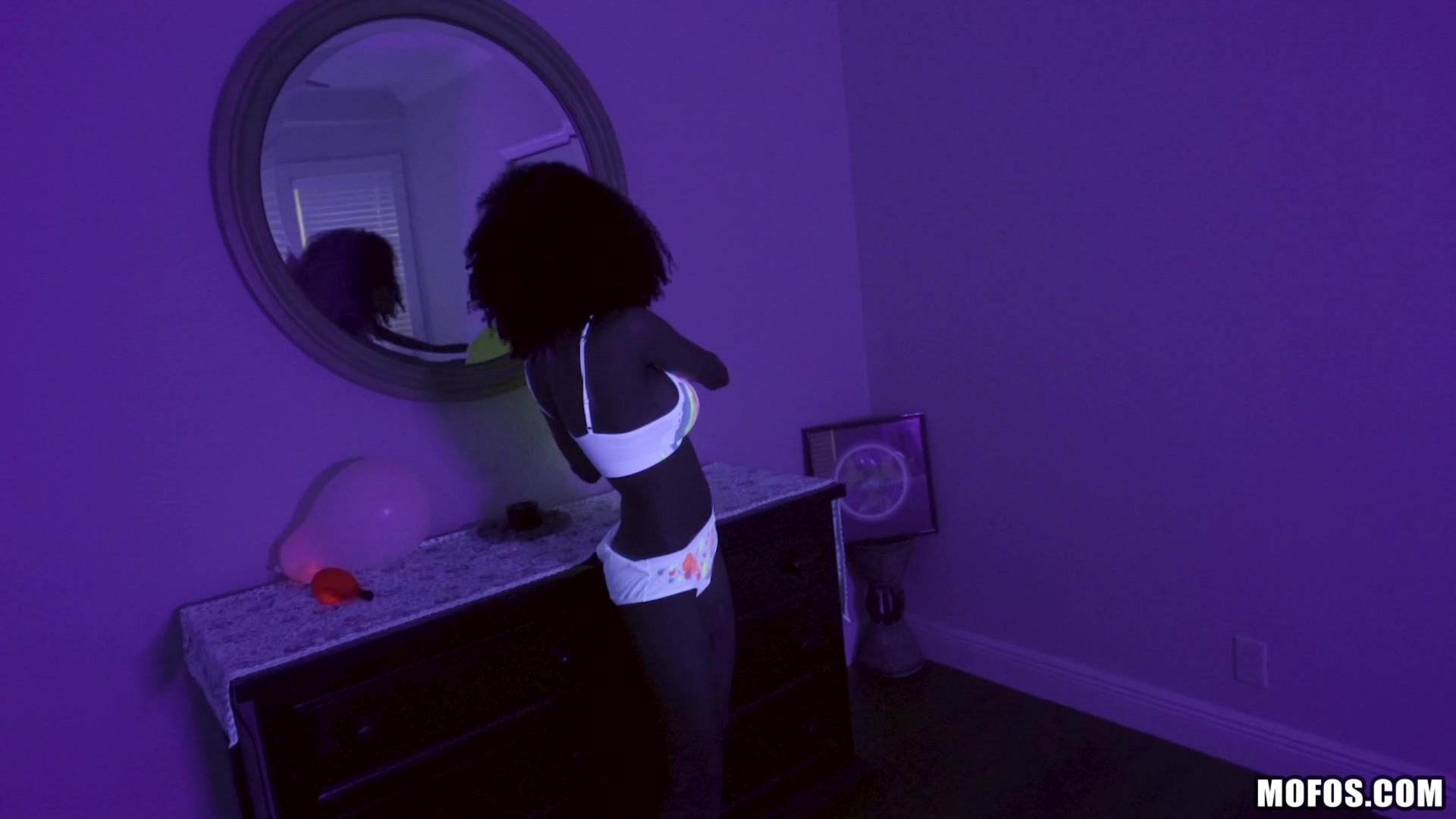 Busty Black Light Babe