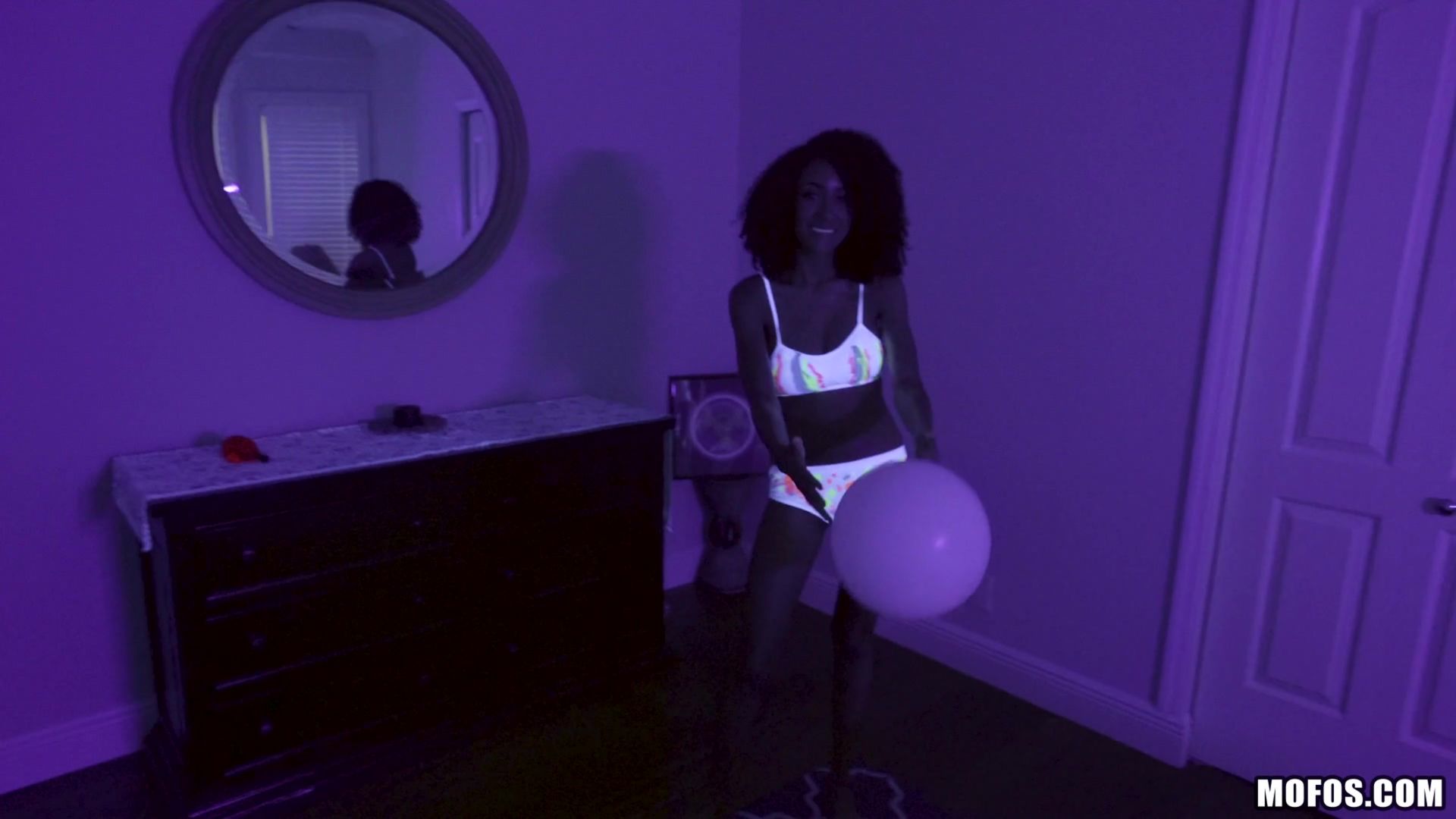 Busty Black Light Babe