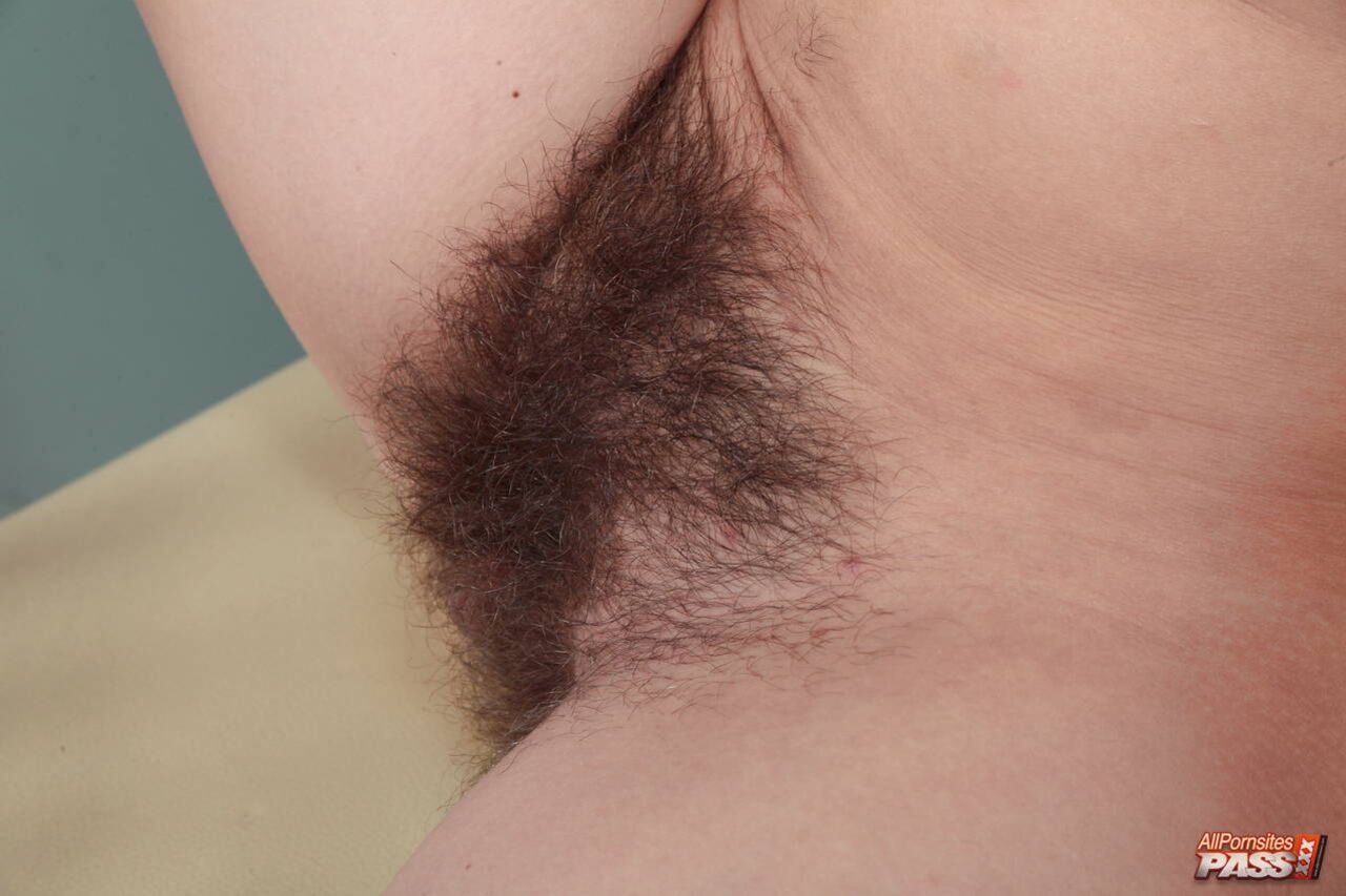 Redhead Lexie teases her bush