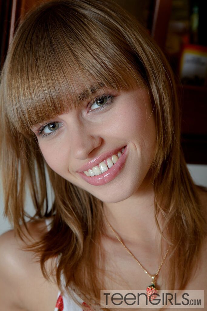 Charming Teen with Beautiful Smile Sits On Huge Dildo
