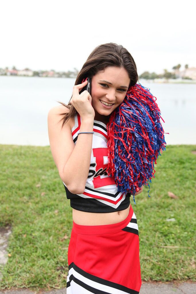 Cheerleader Monica Guides Her Pussy Onto A Stiff Cock