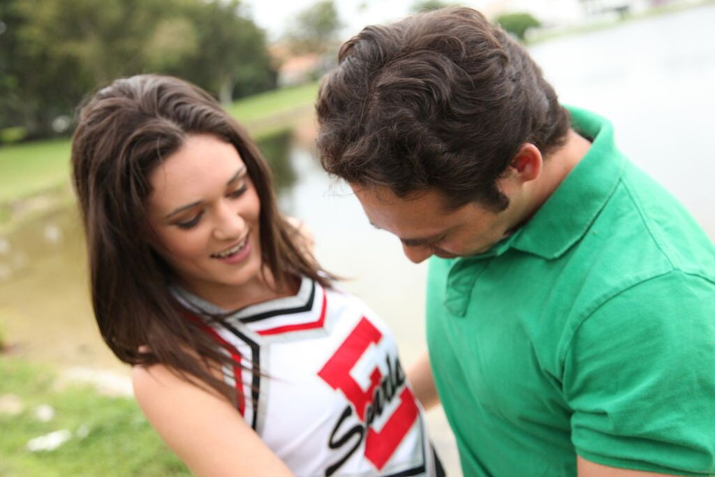 Cheerleader Monica Guides Her Pussy Onto A Stiff Cock