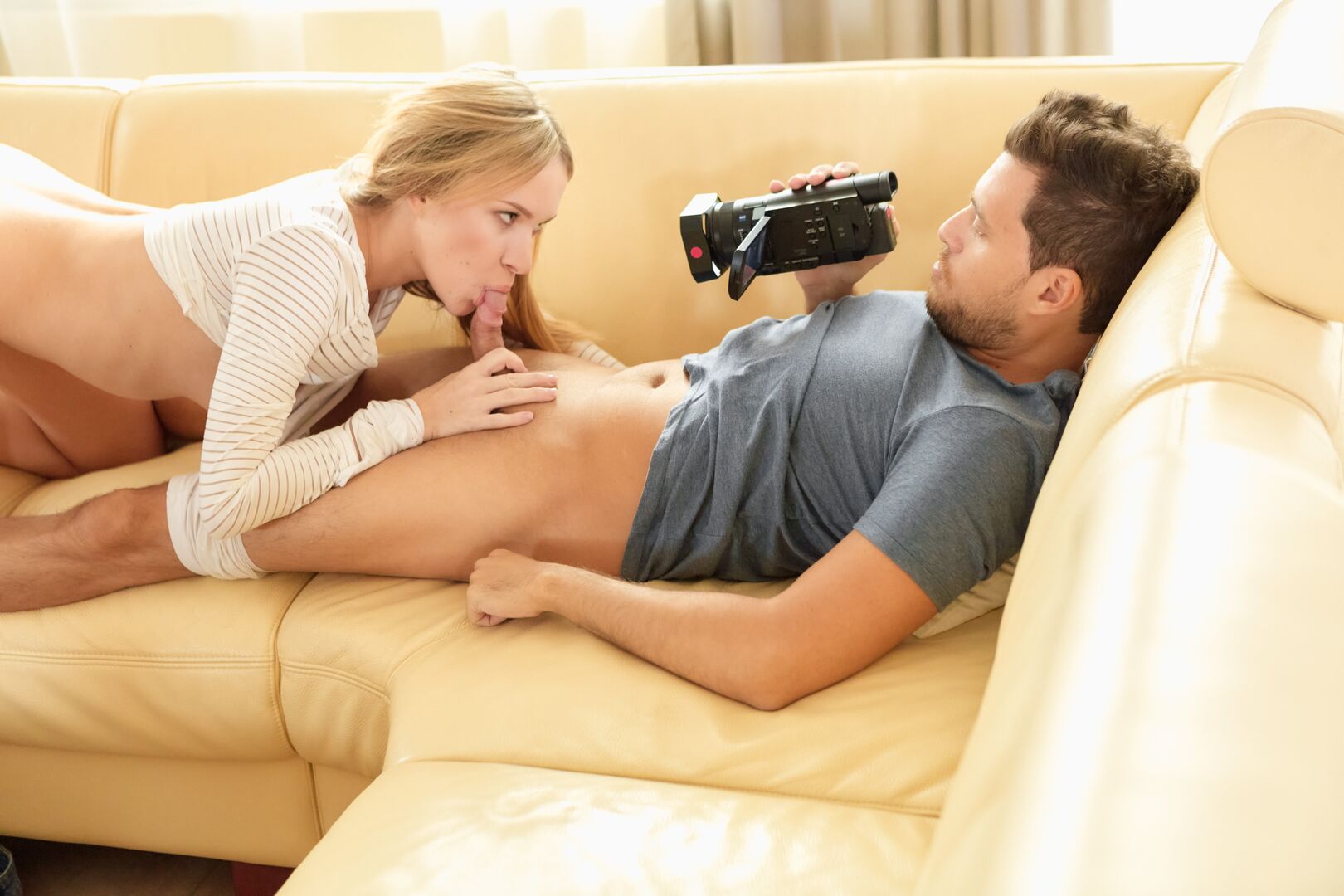 Cutie rides dick with a camera in her hands