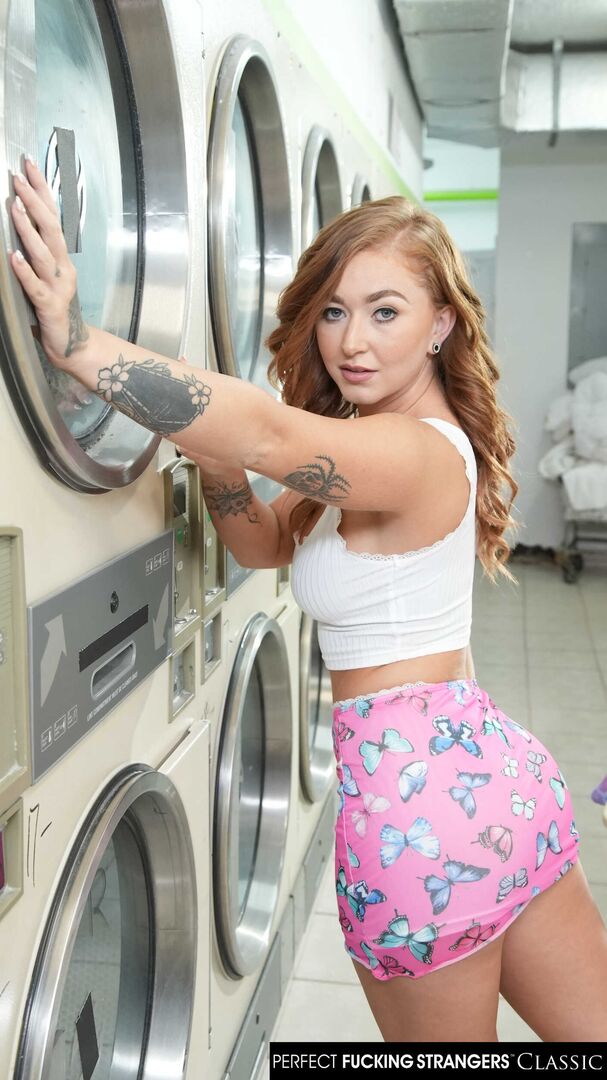 Thick and sexy redhead Callie Black gets hot and dirty cleaning her clothes