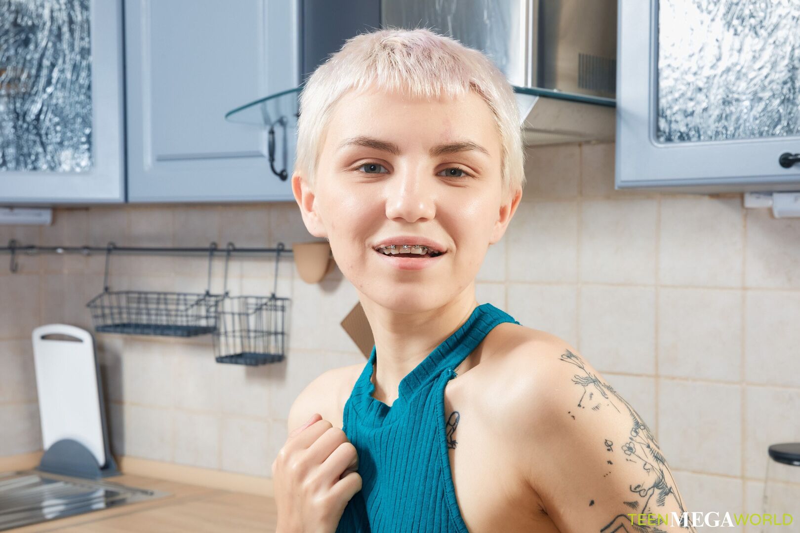 Bored cutie toys her pussy