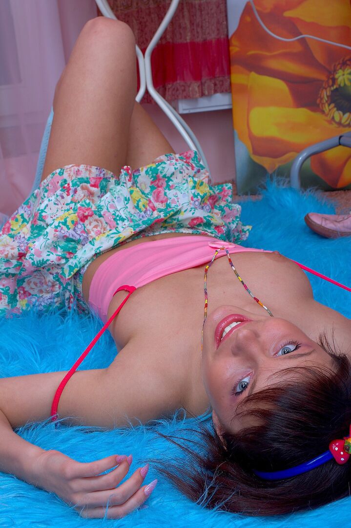 Mesmerizing Teen in Pink Teases in Skirt and Socks