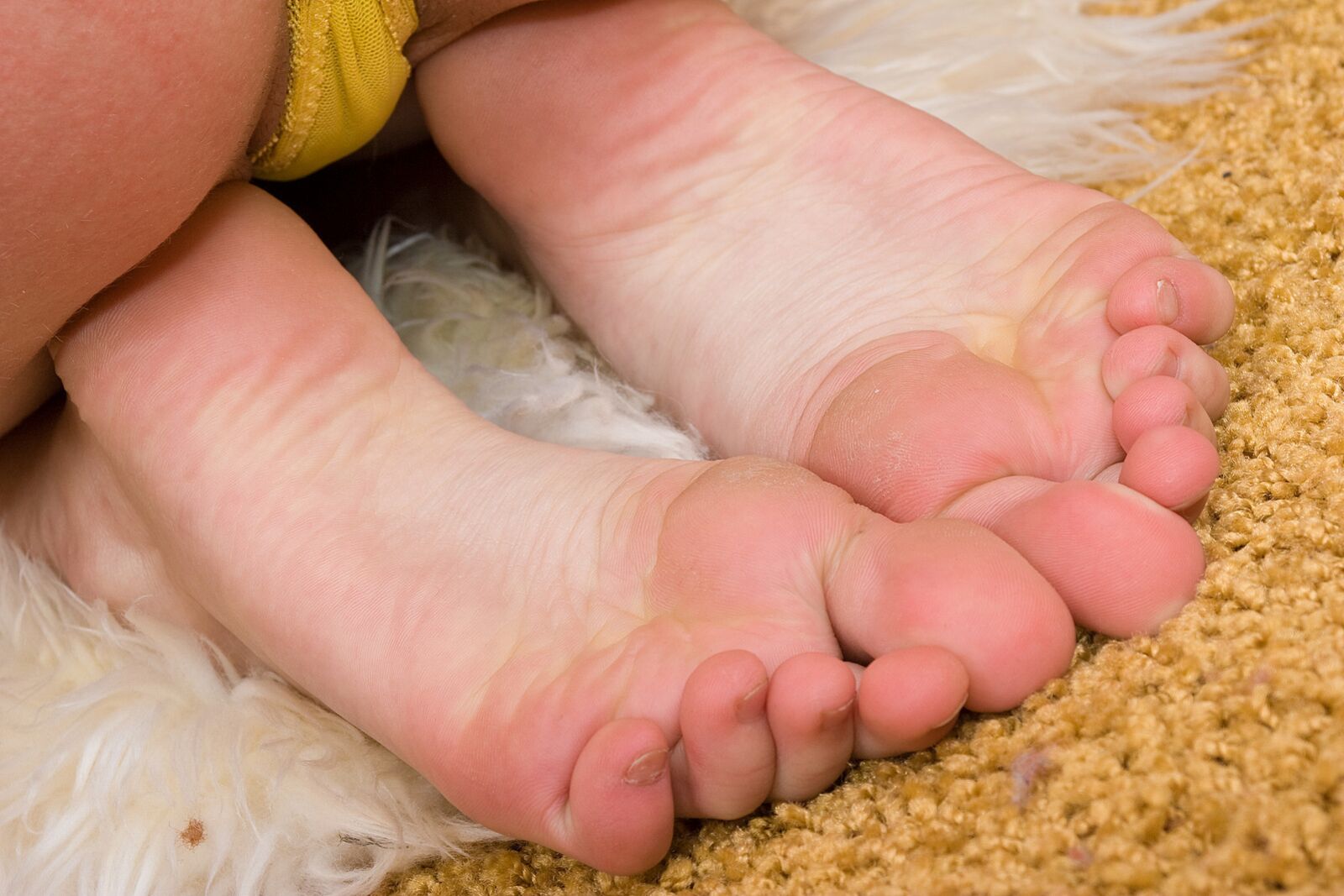 Budding Blonde Teen Gives Erotic Feet Show...