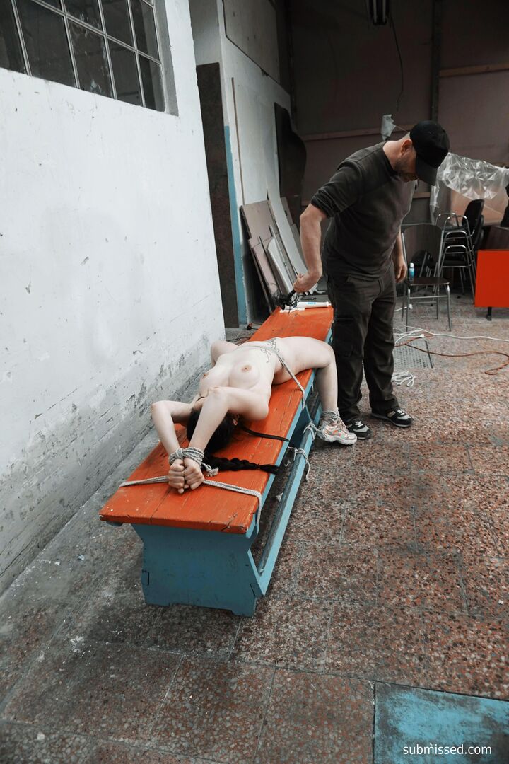 Gagged busty girl plays submissive