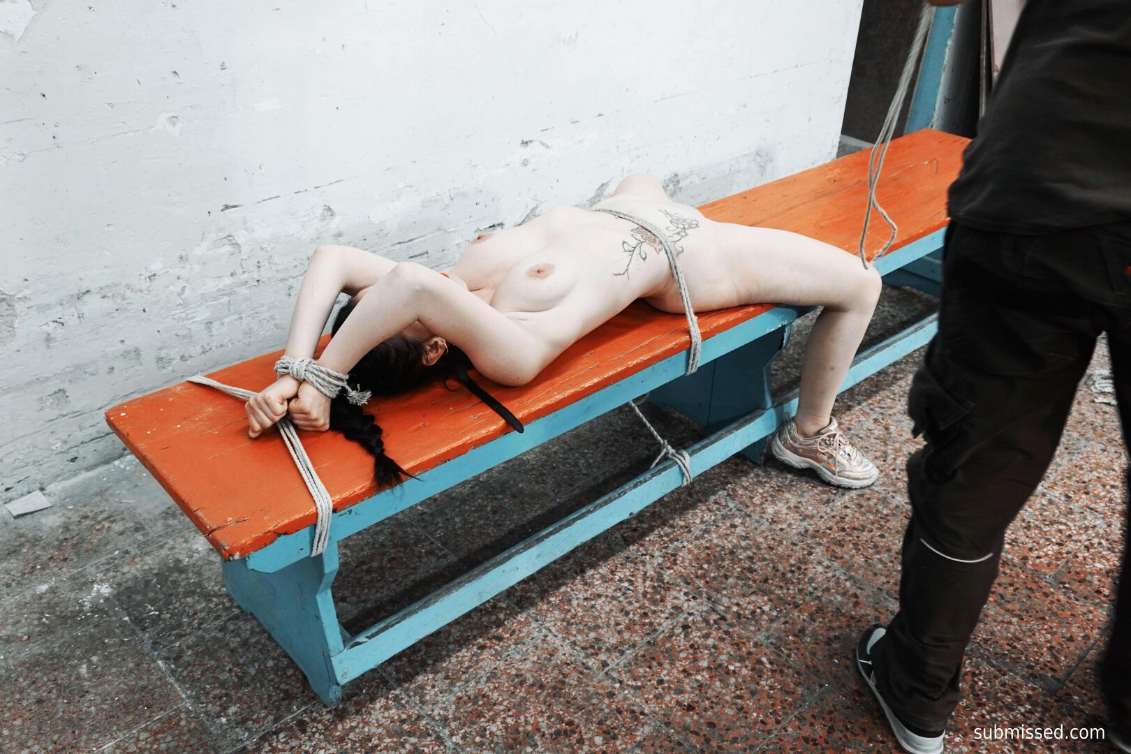 Gagged busty girl plays submissive