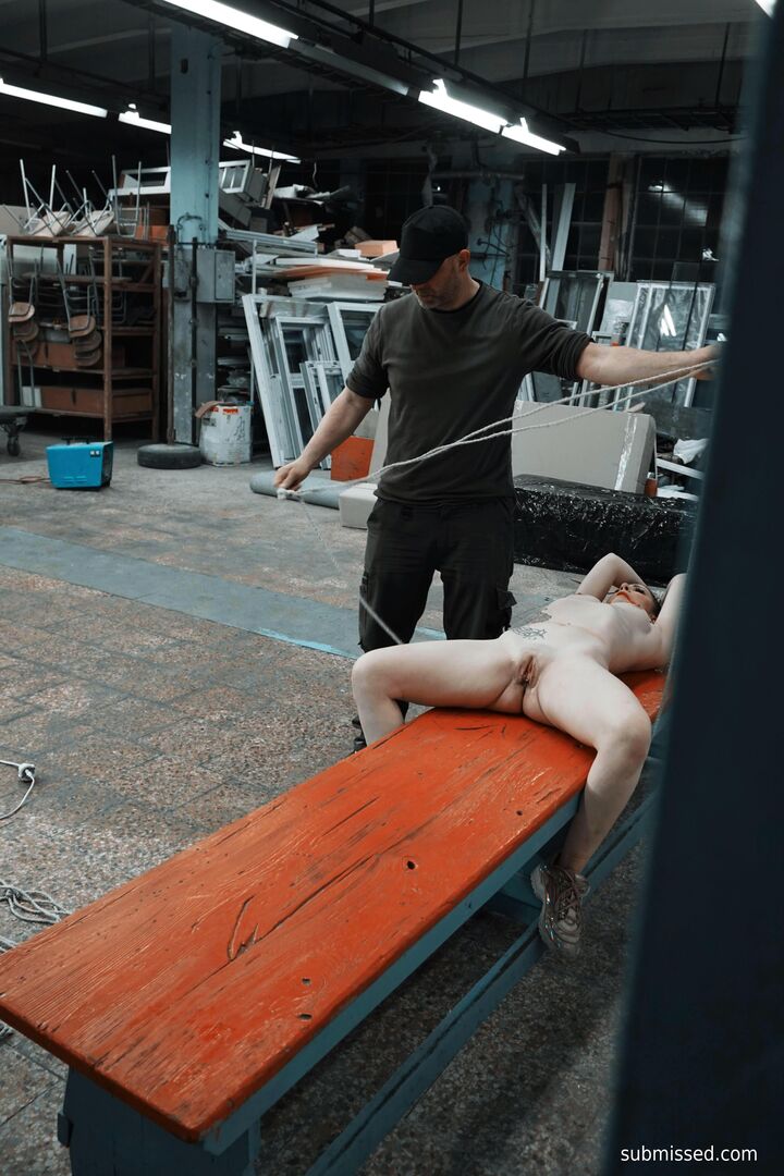 Gagged busty girl plays submissive
