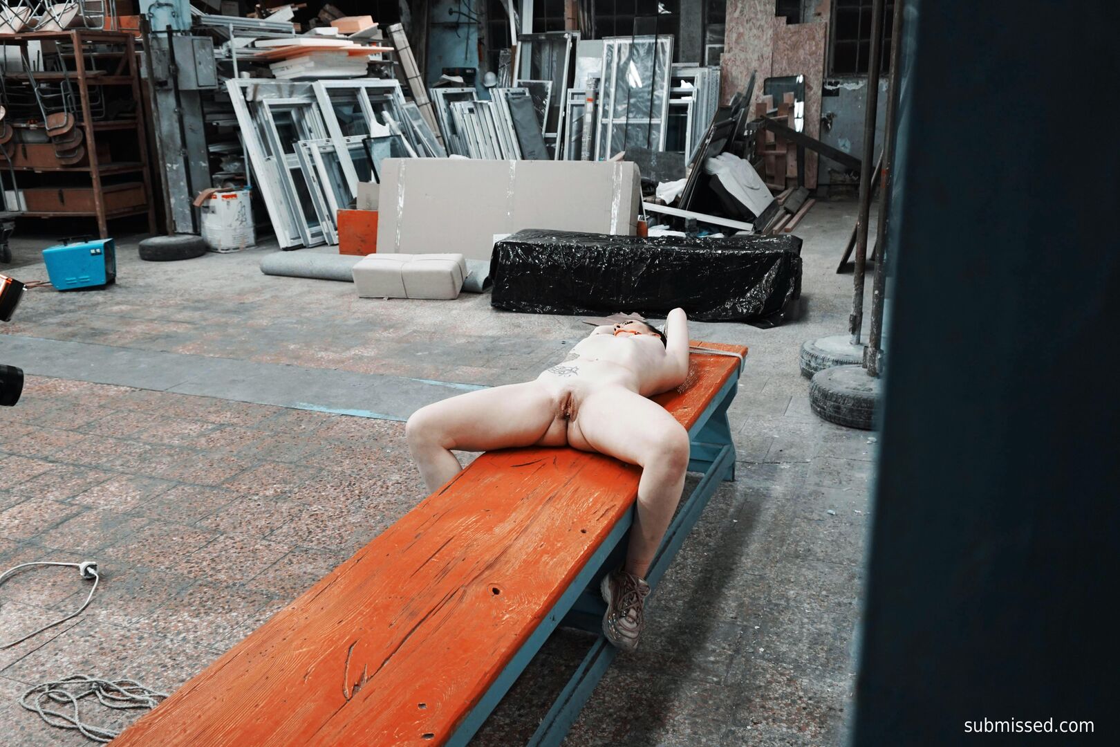 Gagged busty girl plays submissive