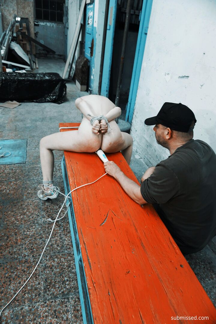 Gagged busty girl plays submissive