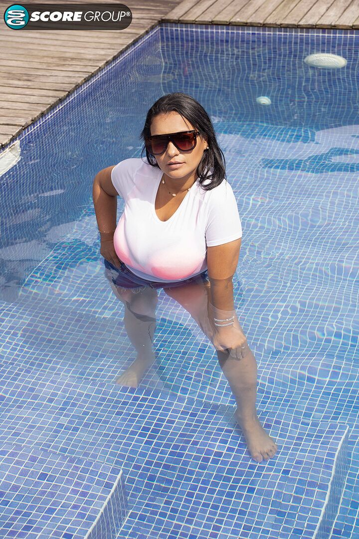 KIM BELTRAN: TITS IN THE SUN